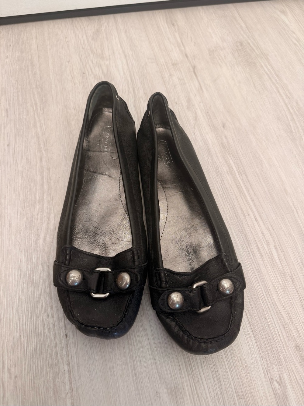 Coach Black Leather Slip-On Loafers with Silver Hardware